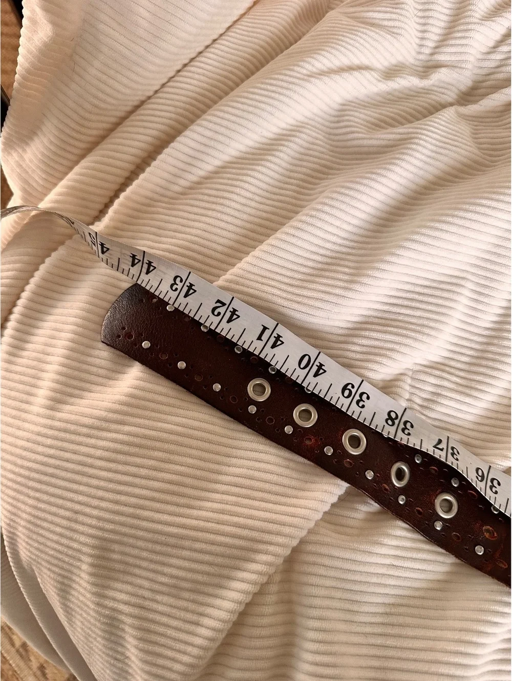 Brown Leather Belt with Silver Eyelets and Round Buckle, Approximately 42 Inches